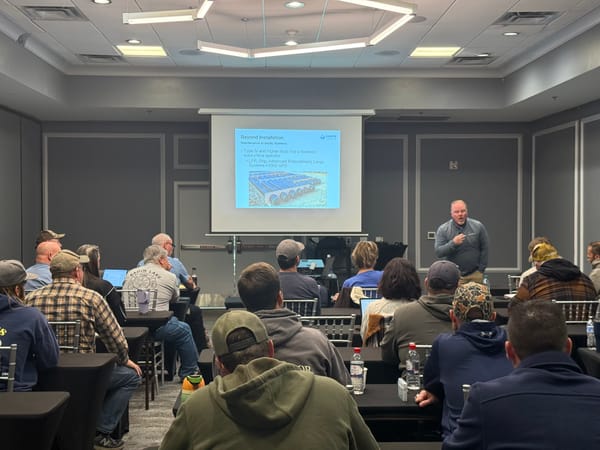 Photo of Jonathan Godfrey teaching a class 